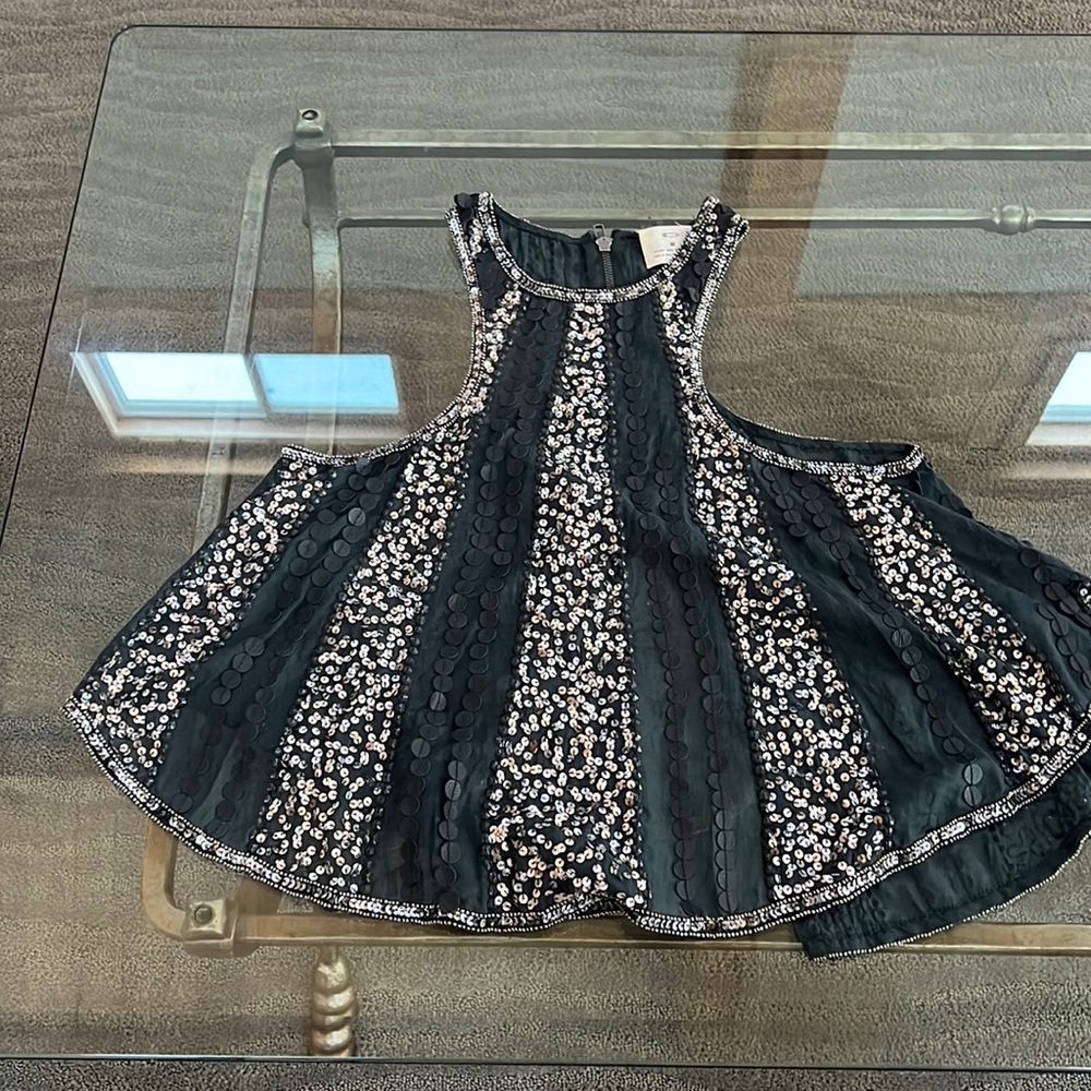 Tank top with sequins and leather